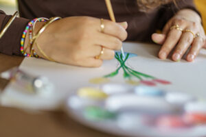 artist painting with watercolor