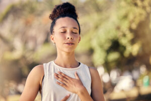 woman doing yoga and meditating